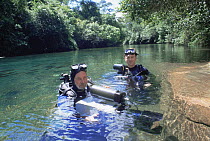 Cameramen Peter Scoones and Doug Anderson filming piranha for BBC Planet Earth series,  Pantanal wetlands, largest wetland habitat in world, South West Brazil. April 2006