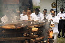 People gathered at Hindu cremation, North Suriname . 2003.