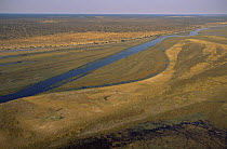 Aerial view of Chobe river and floodplain, Chobe NP, Botswana, with Caprivi Strip, Namibia, in background.