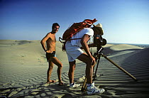 Nigel Marven, producer, with Rupert Jackman, cameraman, in Repetek desert, Turkmenistan, filming for BBC 'Walking with Dinosaurs' 1998