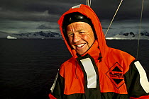 Camerman Doug Allan on boat on location in Antarctic peninsula during shoot for Planet Earth. 2005