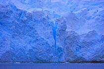 Blue iceberg with visible crack, Antarctica