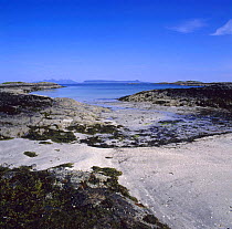Isle of Eigg viewed from Arisaig on the Scottish mainland, low tide, West coast, Scotland, UK