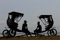 Local rickshaws (Pousse-pousses) introduced to Madagascar by the British missionaries. Majunga Town. NW MADAGASCAR   2005