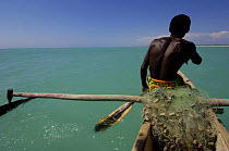 Vezo fisherman out at sea in Pirogue or outrigger canoe Beheloka Vezo fishing village. South-western MADAGASCAR 2005