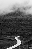 Route 10 winding through basalt landscape, near Skagafjordur, Eysturoy, Faroe Islands. June 2006