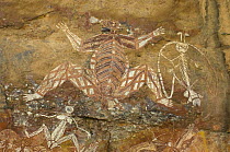 Rock art, Kakadu National Park, Northern Territory, Australia - The central figure is Namondjok, a dangerous spirit; to the right is Namarrgon the lightening man, on the bottom left is Barrginj, Namar...