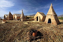 Huts on Uros Floating reed Islands, Lake Titicaca, Peru 2006.