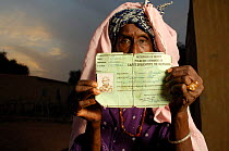 Fulani woman with her refugee identity card, Ndioum camp, North Senegal, West Africa, 2005