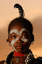 Young Hamer child displays her traditional face paints, Omo valley, Ethiopia, 2006