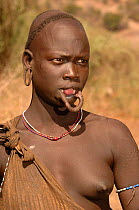 Mursi woman without her large clay plate in lower lip, Omo valley, Ethiopia, 2006