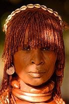 Woman from the Turmi village with traditional hair braiding with mud and butter, and shell jewellery, Omo valley, Ethiopia, 2006