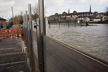 Flood defence barrier keeping flood waters at bay, River Severn, Shrewsbury, Shropshire, UK, winter 2006/7
