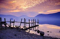 Landing Jetty on shore of Derwentwater at dawn, Lake District National Park, Cumbria, England, UK