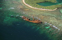 Aerial view of shipwreck on coral reef, Isla de Roatan, Bay Islands, Honduruas, Central America, Atlantic coast 2006