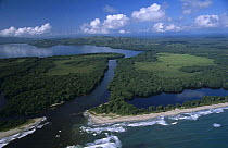 Aerial view of Miami (Caribbean) coast of Honduras with Laguna de los Micos (Lost Lagoon) in the background, Honduras, central America 2006