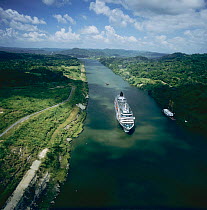 Aerial view of cruise ship, M/V Crystal Symphony, passing through the Panama canal, heading towards Mira Flores Locks, Panama 2005 2006