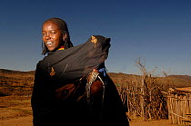 Young Borona woman with child, Oma valley, Ethiopia 2006