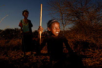 Young girls from the Borona tribe, watching over goats in the bush. Omo valley, South Ethiopia. 2006