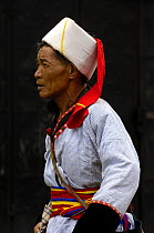 Black Lisu ethnic minority man at a market near Fugong, Nujiang Prefecture, Yunnan Province, China 2006