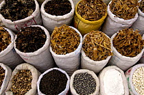 Dried goods for sale at a market in Xizhou - a small Bai village about 20 km north of Dali - Yunnan Province, China 2006