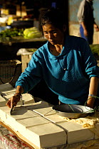 Chinese tofu vendor, Yuanyang Market, Honghe Prefecture, Yunnan Province, China 2006