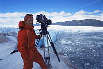 Doug Allan filming at the glacier front of Piu XI Glacier for BBC NHU 'The Blue Planet'. South Chile, 1997