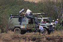 Film crew filming and sound recording for BBC NHU 'Big Cat Diary', Masai Mara GR, Kenya