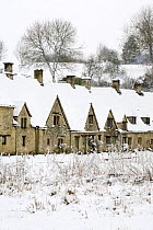 Medieval cottages at Arlington Row in the winter, Bibury, The Cotswolds, Gloucestershire, England