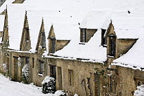 Medieval cottages at Arlington Row in the winter, Bibury, The Cotswolds, Gloucestershire, England