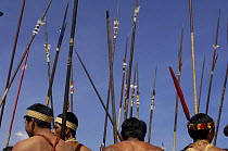 Huaorani indian men with spears in Quito for a protest march against Petrobras, a Brazilian oil company who wanted to build another access road into Yasuni National Park, Ecuador, July 2005