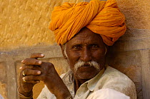 Rajasthani man wearing the traditional moustache and turban, Jaisalmer. Rajasthan, India 2006