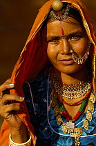 Woman wearing traditional saree and silver jewellery. Jaisalmer. Rajasthan, India 2006