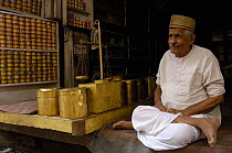 Tobacco and snuff seller in bazaar of Jodhpur. Rajasthan, India 2006