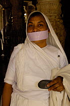 Nun in Jain Temple, 15th century Adinatha Temple at Ranakpur, Rajasthan, India 2006