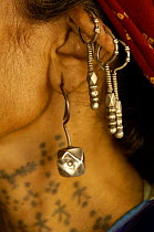 Ornate ear rings of Rabari woman of the Sorathi subgroup found in and around the Gir Forest National Park, Gujarat, India. 2006
