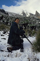 Richard Kirby filming in deep snow on the equator on Mount Kenya for BBC NHU "Private Life of Plants" 1990s