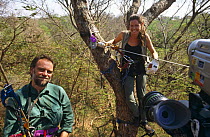 Presenter Charlotte Uhlenbroek and Assistant Producer Phil Hurrell on zip wire. On location in Madagascar, filming for BBC television series "Cousins", 1999