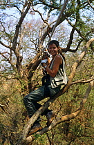 Presenter Charlotte Uhlenbroek on zip wire. On location in Madagascar, filming for BBC television series "Cousins", 1999