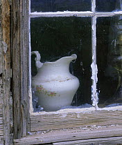 Old porcelain jug in the window of Olmstead Cabin, Olmstead Place Heritage Area, Washington, USA