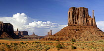 The Mittens and clouds forming over the Monument Valley Navajo Tribal Park, Arizona, USA May 2007