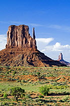 The Mittens and clouds forming over the Monument Valley Navajo Tribal Park, Arizona, USA May 2007