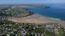 Aerial view of Polzeath town and beach at low tide, looking towards the River Camel estuary, Cornwall, England 2007