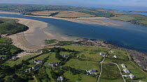 Aerial view above Daymer Bay across the River Camel estuary towards Padstow, low tide, Cornwall, England, 2007