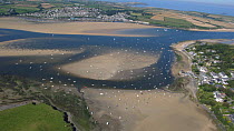 Aerial view of the village of Rock with Padstow in background across the River Camel estuary at low tide, Cornwall, England 2007