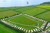 Aerial views of campsite anc caravan park near Sidmouth and Branscombe, Devon, UK, 2007~Note - shipwrecked 'Napoli' sitting off the coastline in background