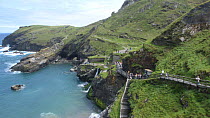 Ruins of Tintagel castle on Cornish costline, UK dating back to 13th century