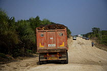 Lorry / truck on a gravel road to palm tree oil plantations close to the Kinabatangan River, Sabah, Borneo, Malaysia