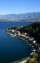 Novigrad fishing village, Zadar-Knin region, Croatia with Velebit mountain range in background. 2007