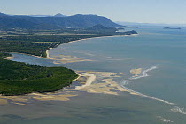 Aerial view of mudflats, mangroves and mountains near Cairns, Queensland, Australia